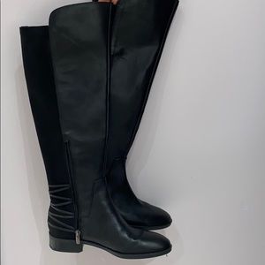 Black leather high boots